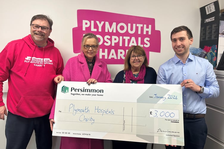 Plymouth Hospitals Charity receive a cheque from Persimmon
