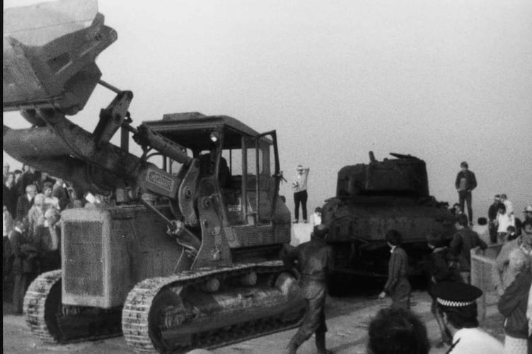 Sherman tank emerges from the sea off Torcross.