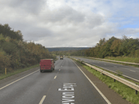 Overturned trailer causing delays on A38 