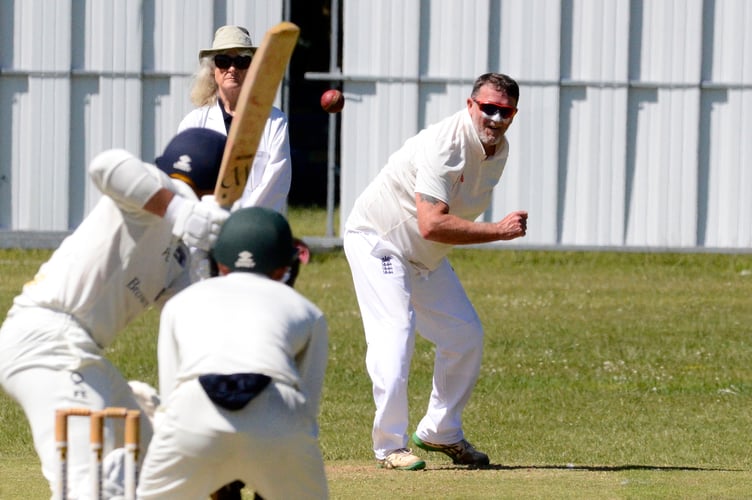 Ivybridge 2nd XI veteran Adrian Pullin bowling in his side's victory over Torquay & Kingskerswell 2nd XI