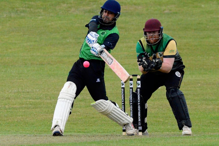 Ivybridge's Dinesh Raheja hits out against the Bradninch & Kentisbeare bowling