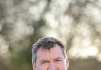 Retired CEO receives OBE for services to education