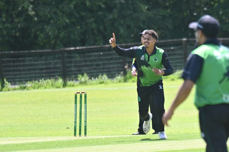 Devon Cricket League A Division. Ivybridge versus Bovey Tracey. Ivybridge bowler Michael Copeland