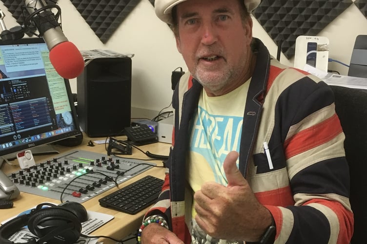 Stuart Hughes, a longstanding Sidmouth councillor, recorded the Wrapped in Sidmouth song as part of the Rotary Christmas Appeal (Image courtesy: Stuart Hughes).