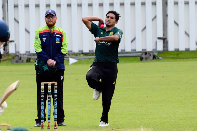 Cornwood's opening bowler Mohsin Khan leaps Into his bowling stride in the seven-wicket home defeat by Exeter56_Mohsin Khan_4169 copy
