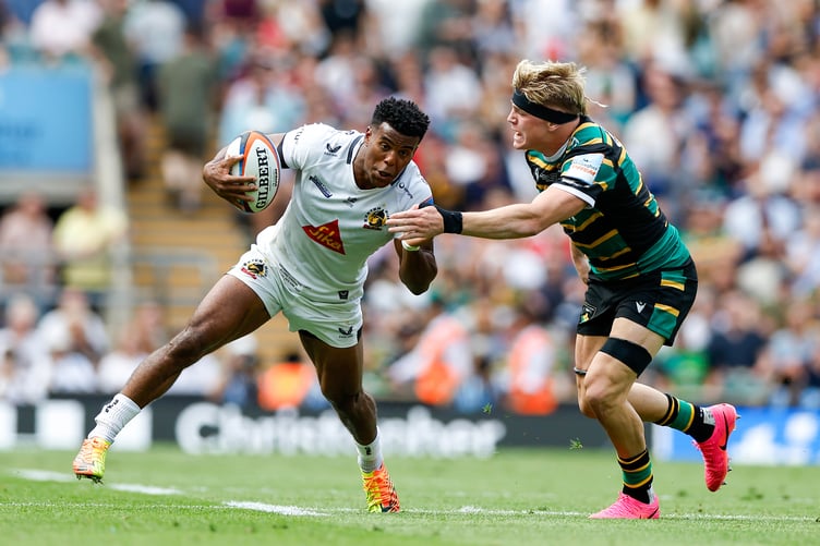 Manny Feyi-Waboso of Exeter Chiefs gets away from Henry Pollock of Northampton