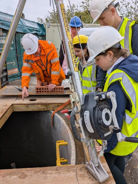 Kingsbridge Community College engineering students visited the culvert site.