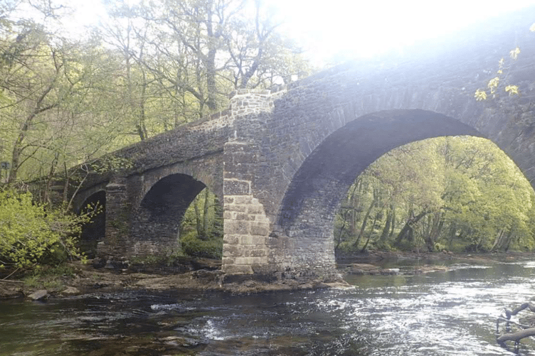 Completed repair of Austins Bridge in 2021, after storm debris damaged left sections of the bridge suspended.