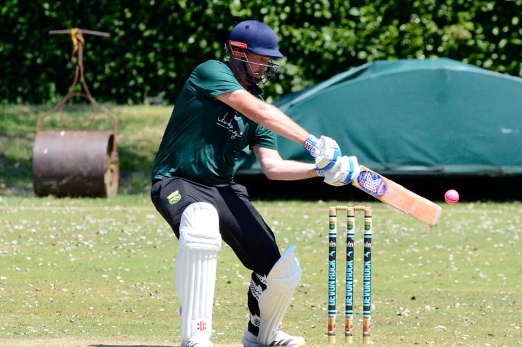 Cornwood's Charlie Finan shapes up to cut the bowling during his innings of 39 in the 49-run win over Paignton