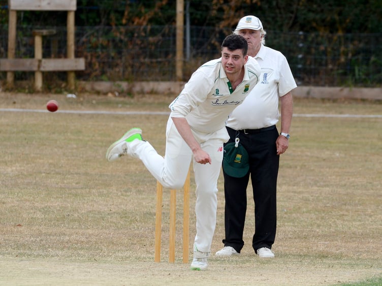 Cornwood's Josiah Caunter toiling up the hill against Abbotskerswell