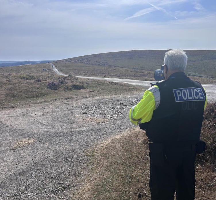 A police officer carries out a speed check